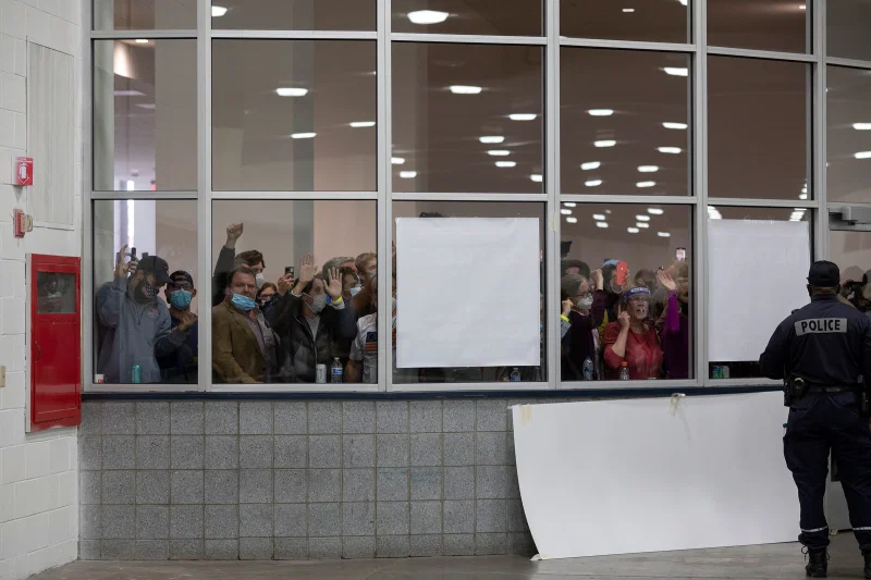 Trump supporters seek to disrupt the vote count at Detroit’s TCF Center on Nov. 4